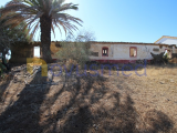 Secluded ruin with rustic land, green area, Algarve