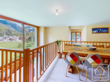 Charming two-bedroom duplex apartment with stunning mountain views, nestled in the serene surroundin