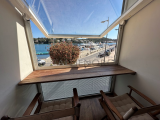 Spacious front line apartment on the harbour of Mahon with parking