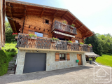 Wooden chalet, 4 bedrooms, triple garage, view of the Aravis.