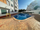 4 bedroom duplex flat with pool and lift in the centre of Albufeira with garage, good areas, 3 bathr