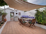 A stunning five bedroom house with private garden right in the centre of Mahon.