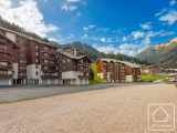 An atypical 1 bedroom apartment with coin montagne, cave and parking space.