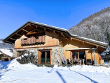 A stunning four-bedroom chalet situated in the highly sought-after area of Samoëns.